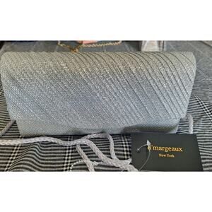 d'margeaux brand clutch purse- silver metallic w/rope strap- 8"w x 4"h- NWT
